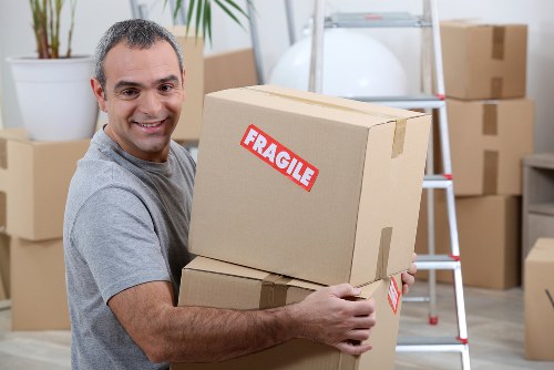 Office removals planning in North Sheen with moving boxes and business furniture