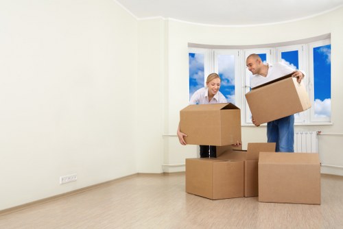 Packing and loading belongings into a moving truck in North Sheen