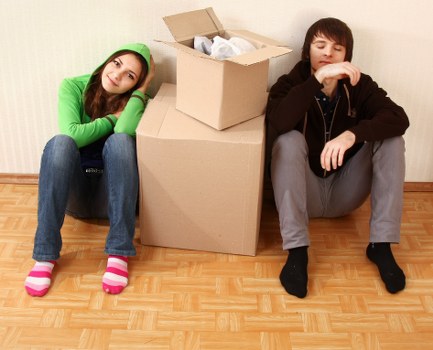 Professional office moving team handling equipment and furniture