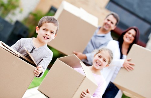 Professional movers handling furniture during a North Sheen relocation
