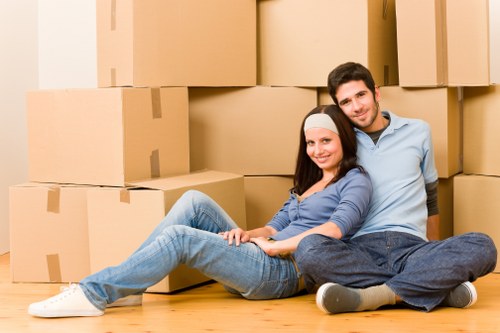 Professional movers loading household items for a North Sheen relocation