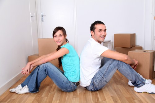 Professional office furniture dismantling and loading for a North Sheen relocation