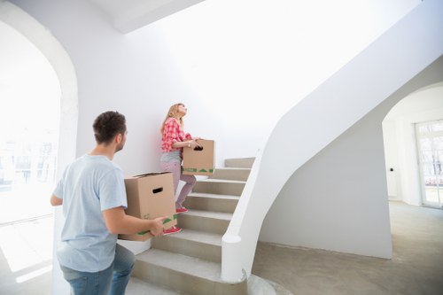 Preparing boxes and furniture for a van move in North Sheen